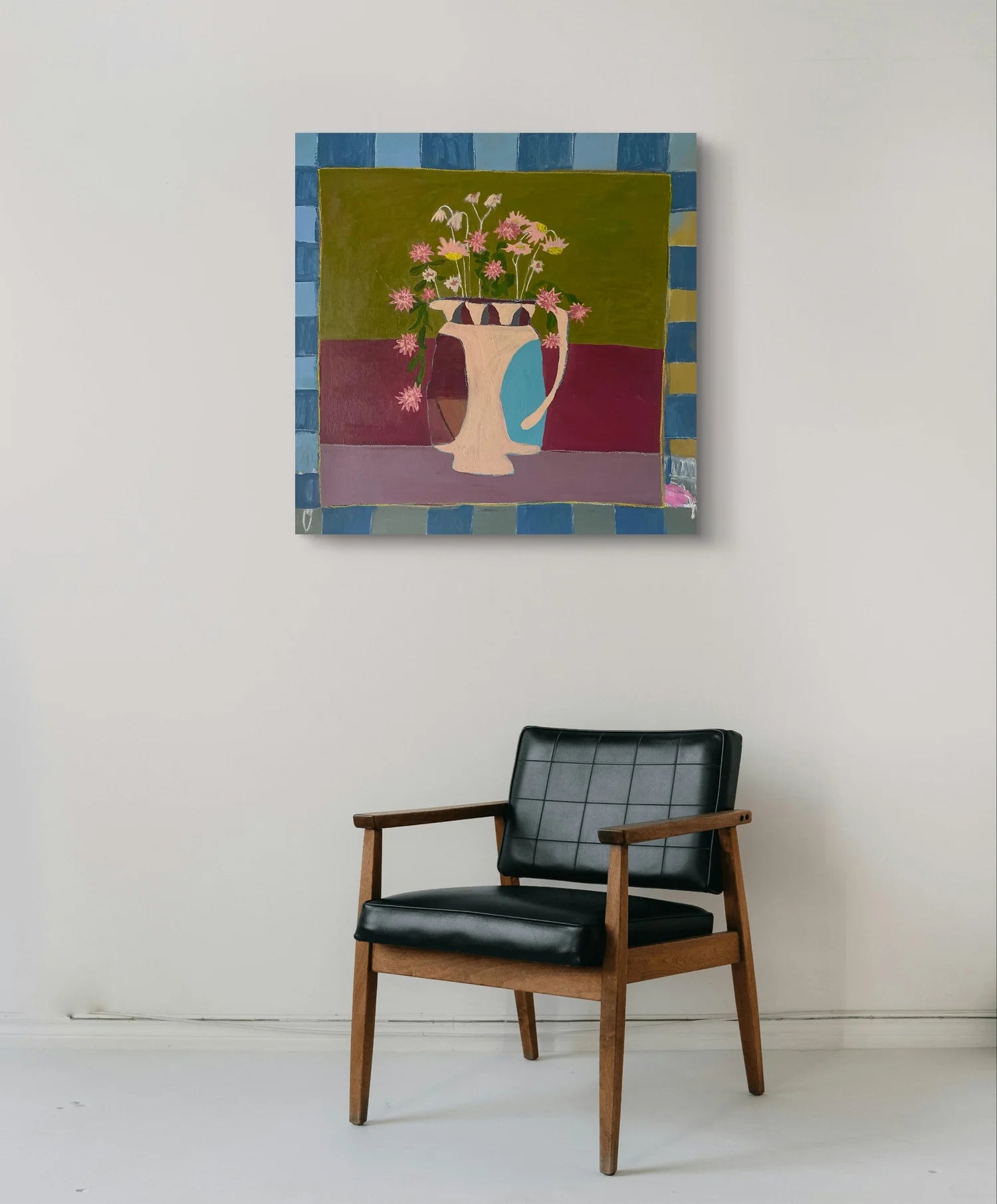 Painting of a vase with flowers on a striped background above a black chair. "The Vase In My Room & The Flowers For You original painting by Marley Alvarez"