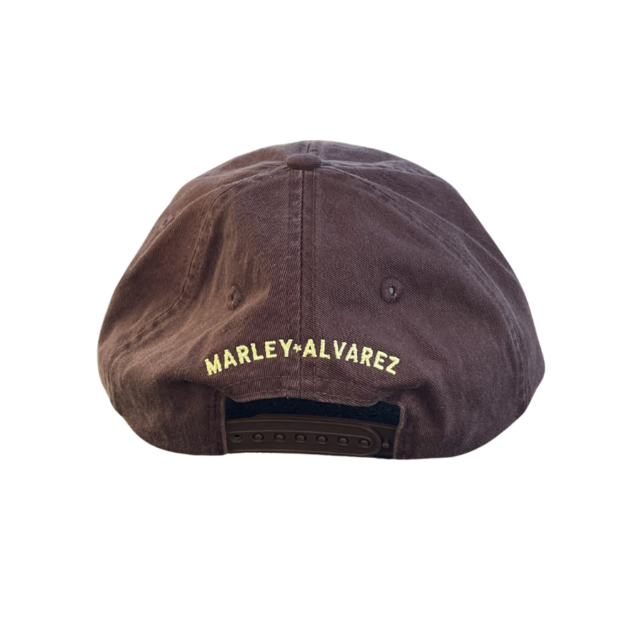 Brown cap with 'Marley Alvarez' branding on a white background
