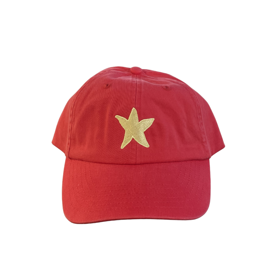 Red cap with a yellow star on a white background