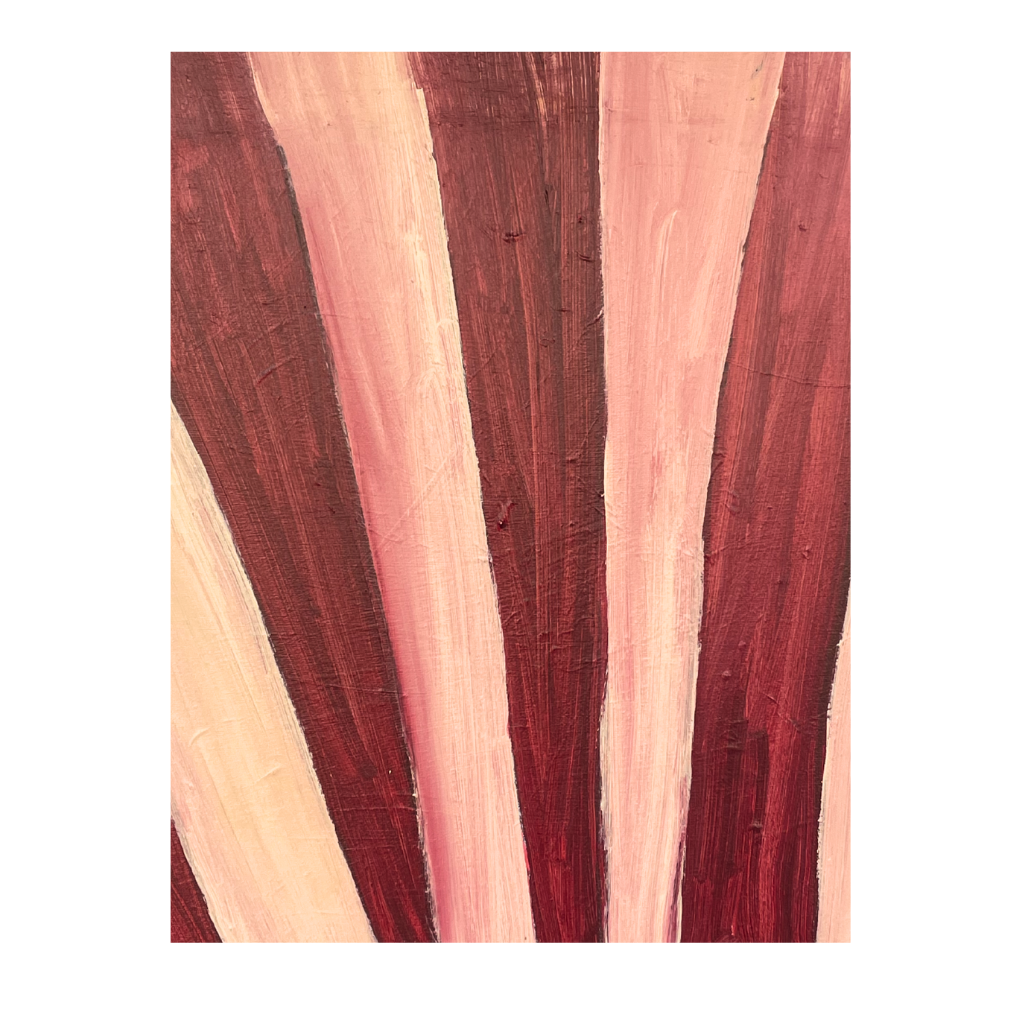 Close-up of a wooden surface with red and beige stripes